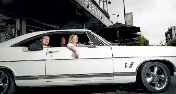  ?? BRADEN FASTIER/STUFF ?? Uniquely Nelson manager Simon Duffy, left and Morrison Square centre manager Ange Leonard go for a cruise in a 1967 Ford Galaxie to get in the mood for the inugural Street Hop in Hardy St next weekend.