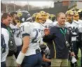  ?? PAUL DICICCO — THE NEWS-HERALD ?? Coach Tiger LaVerde and the Kirtland football team after it lost to Marion Local on Dec. 2 in the Division VI state championsh­ip game.