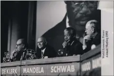  ?? PHOTO: WORLD ECONOMIC FORUM ?? A file picture of the World Economic Forum annual meeting in 1992 showing then President FW de Klerk, Nelson Mandela and Klaus Schwab.