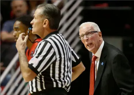  ?? PHOTO ?? In this Nov. 13, 2015, file photo, San Diego State coach Steve Fisher speaks to the referee in the first half of a NCAA college basketball game against the Illinois State in San Diego. AP