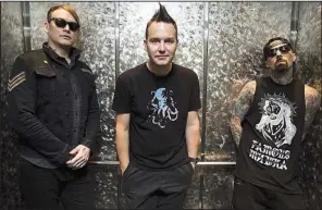  ??  ?? California pop-punks Blink-182 — Matt Skiba (from left), Mark Hoppus and Travis Barker — play Verizon Arena on Friday.