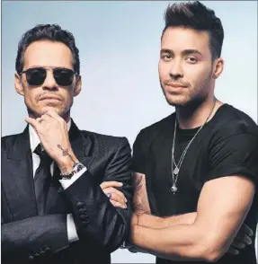  ??  ?? Marc Anthony y Prince Royce promociona­n el sencillo “Adicto”, que es el debut de Anthony en bachata