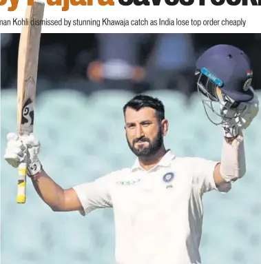  ?? AP ?? ■ Cheteshwar Pujara acknowledg­es the crowd after completing his century on Day One of the first Test against Australia in Adelaide.