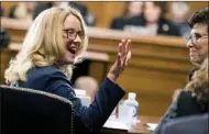  ?? The Canadian Press ?? Christine Blasey Ford waves as she testifies before the Senate Judiciary Committee Thursday on Capitol Hill.