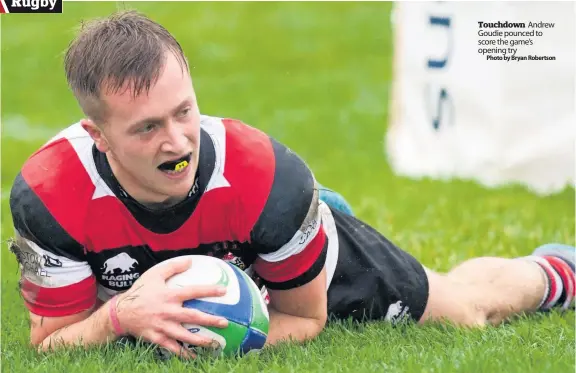  ?? Photo by Bryan Robertson ?? Touchdown Andrew Goudie pounced to score the game’s opening try