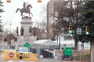  ?? MAHONEY/RICHMOND TIMES-DISPATCH VIA AP JOE ?? Barriers are set up at the Virginia State Capitol in Richmond on Saturday in anticipati­on of a rally by a large number of gun-rights backers Monday.