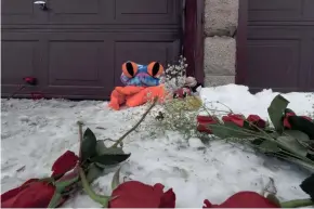  ??  ?? Flowers and stuffed animals lie outside a garage where the bodies of homicide victims Amarah J. Banks, 26, and her daughters, Zaniya R. Ivery, 5, and Camaria Banks, 4, were found on Feb. 16.