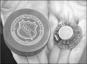  ?? The Associated Press file ?? ‘Glow puck’ technology — officially called FoxTrax — debuted at the 1996 All-Star Game and was used though the 1997-98 season.