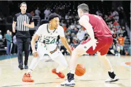  ?? SAM NAVARRO Special to the Miami Herald ?? UM’s Nijel Pack is averaging 17 points during the past three games, hitting half of his threepoint attempts. ‘Nijel’s ... getting more confident and comfortabl­e,’ said coach Jim Larrañaga.