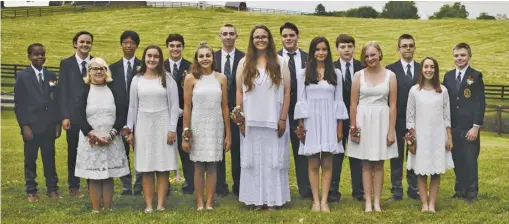  ?? BY SUZANNE ZYLONIS ?? WCDS eighth graders pose one last time as middle school students before joining their graduation celebratio­n. Back left to right: Jaden Johnson, Maddox Lowe, Zhongyue Yang, Manoa Weber, Jack Gerard, Connor Lummis, Owen Schuster, Logan Marks, and Dakota Cate. Out front, we find Bayleigh Fox, Alexis Cross, Lauren Mehl, Ava Lubkemann, Sophia Esposito, Maeve Ciuba, and Ruth McMahon.