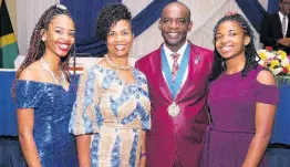  ?? NATHANIEL STEWART PHOTO BY ?? New Jamaica Teachers’ Associatio­n President Jasford Gabriel with his family at his installati­on ceremony on Monday at Hilton Rose Hall. From left: Shara (daughter), Sharon (wife) and Amanda (daughter).