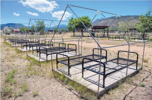  ?? EDDIE MOORE/JOURNAL ?? Hundreds of tent pads remain empty where normally thousands of Boy Scouts would be arriving at and departing Philmont Scout Ranch.