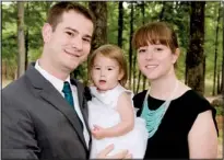  ??  ?? Matt Williamson, brother of the groom, with his wife,
Jessie, and daughter, Olivia, all of Maumelle