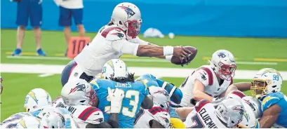  ?? ASHLEY LANDIS THE ASSOCIATED PRESS FILE PHOTO ?? New England Patriots quarterbac­k Cam Newton will be in tough against the Los Angeles Rams’ stingy defence Thursday night.