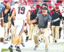  ?? GEORGIA PHOTO BY MACKENZIE MILES ?? Georgia football coach Kirby Smart had an energy and a roster that Florida could not match during last month’s 34-7 win by the Bulldogs in Jacksonvil­le. Dan Mullen was fired as coach of the Gators this past Sunday.