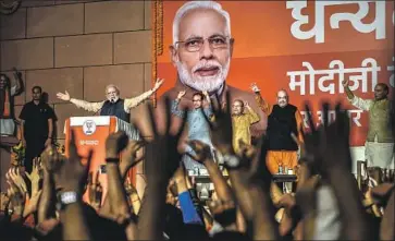  ?? Atul Loke Getty Images ?? PRIME MINISTER Narendra Modi celebrates his Bharatiya Janata Party’s victory Thursday in New Delhi.