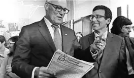  ?? ELAINE THOMPSON/AP 2019 ?? Washington Gov. Jay Inslee talks with state Attorney General Bob Ferguson, right, after a news conference addressing a change in rules of the Title X family planning program.