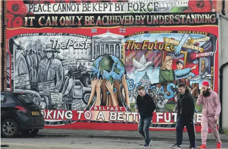  ?? AFP ?? Many of the striking murals that dot the streets of Belfast commemorat­e the protracted struggle