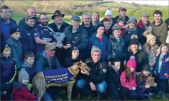  ??  ?? Connection­s of Octane Wonder, who won the Corn na Feile All-Age Cup at Abbeyfeale coursing meeting last week, including winning owner Tom Nolan (left) from Castleisla­nd and trainer Mossie O’Connor Photo by Moss Joe Browne