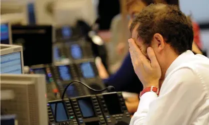  ??  ?? Prices fell in markets across Asia and Europe on a day of selling. Early falls in the US were mostly reversed. Photograph: Daniel Dal Zennaro/ EPA