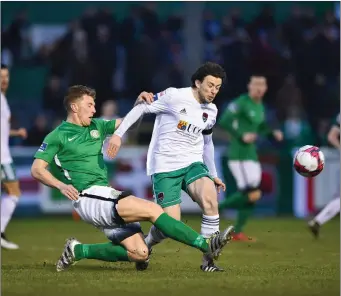  ??  ?? John Sullivan of Bray Wanderers challenges Barry McNamee of Cork City during the SSE Airtricity League Premier Division match at the Carlisle Grounds.