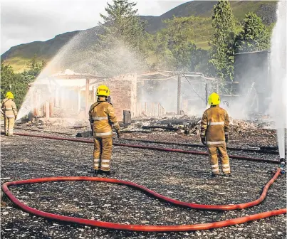  ?? Picture: Steve MacDougall. ?? Fire crews tackling the blaze at the Spittal of Glenshee Hotel in 2014.