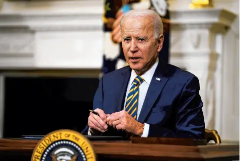  ?? EVAN VUCCI/AP ?? White House officials say higher wages are a goal of President Biden and a byproduct of key legislatio­n he has championed since being elected. Republican­s believe minimizing taxes and lowering barriers is key to economic recovery.