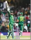  ?? ?? Pakistan’s Shadab Khan celebrates after scoring 50 runs during the T20 World Cup cricket match between Pakistan and South Africa in Sydney, Australia. (AP)