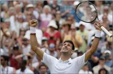  ??  ?? Serbian Novak Djokovic celebrates after defeating Belgian David Goffin during the quarterfin­al match of Wimbledon, in London, on Wednesday
AP PhoTo / TIM IrelAnd