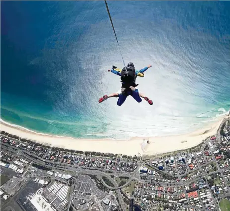  ?? — Gold Coast Skydive ?? Soak in the breathtaki­ng scenery below as you float down to Kirra beach.