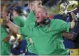  ?? PAUL SANCYA — THE ASSOCIATED PRESS FILE ?? In this file photo, Notre Dame head coach Brian Kelly argues a call in the second half of an NCAA football game against Michigan, in South Bend, Ind. Notre Dame and Georgia, two of college football’s most storied programs, meet for the first time Saturday.