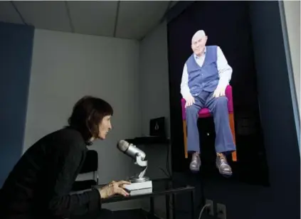  ?? CARLOS OSORIO/TORONTO STAR ?? Marie Herrell chats with Pinchas Gutter through an interactiv­e exhibit at Toronto’s Sarah and Chaim Neuberger Holocaust Education Centre.