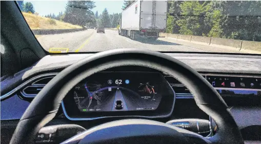  ?? PHOTO: IAN MADDOX ?? Looking at the future . . . Driving in traffic in a 2017 Model X 75D with Tesla’s autopilot controllin­g the distance from the lead car and centering the vehicle in the lane.