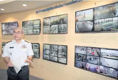  ?? APICHART JINAKUL ?? Marine Department head Sornsak Saensombat discusses safety measures to control Chao Phraya River traffic during the royal funeral rites for the late King.