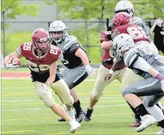  ?? WILLIAM VANDERLAND SPECIAL TO THE ST. CATHARINES STANDARD ?? Niagara's Jacob Succar (28) gaining yardage against London in Ontario Provincial Football League junior varsity Tier 1 division.