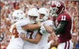  ?? COOPER NEILL — THE ASSOCIATED PRESS ?? In this Oct. 6, 2018, file photo, Texas kicker Cameron Dicker (17) celebrates with teammates after kicking the game-winning field goal in the closing seconds of the second half of an NCAA college football game against Oklahoma at the Cotton Bowl in Dallas.