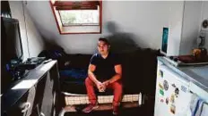  ?? AFP ?? Ivan Lopez in his less than 7 square metre apartment in Paris. He has been repeatedly turned away by rental agencies.