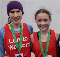  ??  ?? Róisín O’Reilly (Loreto Wexford, left) and Claragh Keane (Presentati­on Wexford, right) after finishing second and first respective­ly in the Intermedia­te girls’ race at the South Leinster cross-country.