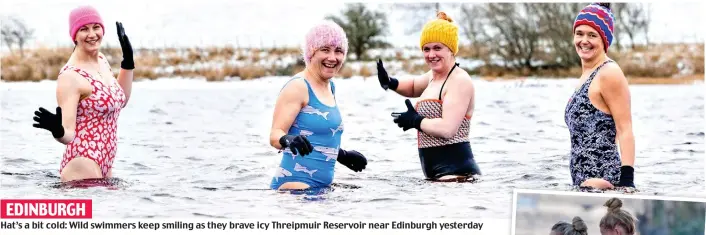  ?? ?? EDINBURGH Hat’s a bit cold: Wild swimmers keep smiling as they brave icy Threipmuir Reservoir near Edinburgh yesterday
