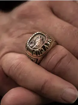  ??  ?? above Leo Ezerins wears his 1986 Grey Cup championsh­ip ring, which he won while playing for the Hamilton Tiger-cats.