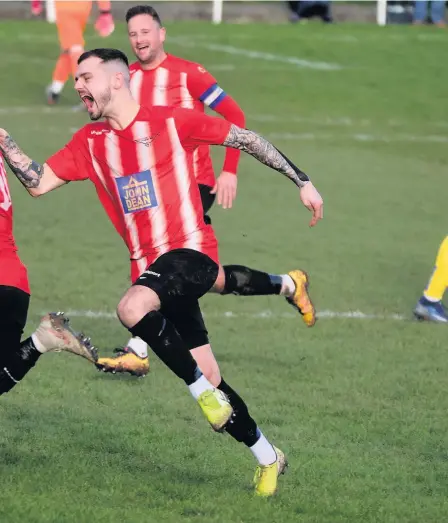  ?? Pictures: Dave Betts ?? Josh Egan, left, celebrates scoring from a free-kick against Sutton Common Rovers