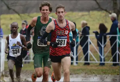  ?? Submitted photo ?? New England Distance Project staff member and coach Aaron Dinezo (381) is shown running in the 2014 NCAA Division II cross country championsh­ips. Trailing Dinezo are Tabor Stevens (Adams State University) and Michael Biwott (American Internatio­nal...