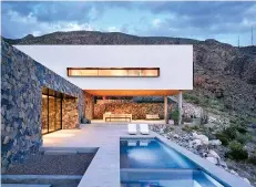  ?? Associated Press ?? ■ This undated photo provided by The Monacelli Press shows is an outdoor living room and lap pool at a house in El Paso Texas and is featured in the book "Texas Made/Texas Modern: the House and the Land" by Helen Thompson.