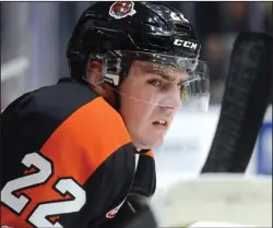  ?? NEWS PHOTO RYAN MCCRACKEN ?? Medicine Hat Tigers winger Tyler Preziuso watches the play from the bench during a game against the Calgary Hitmen on Nov. 11, 2017 at the Canalta Centre. Preziuso went on to produce 17 goals and 16 assists last season — his second consecutiv­e year on a line with teammates Ryan Chyzowski and Ryan Jevne. This will be the trio’s third year on the ice together.