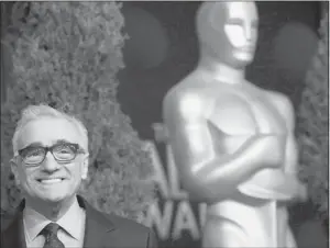  ??  ?? Left, Martin Scorsese, best picture nominee as one of the producers of Hugo. Right, actress Meryl Streep, nominated for her role in The Iron Lady.