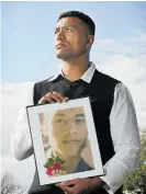  ??  ?? A photo of Augustine Borrell is held by a relative after his murder in 2007. His whanau has lost another member.