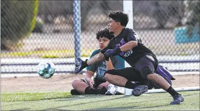  ?? Chase Stevens Las Vegas Review-journal @csstevensp­hoto ?? Equipo Academy goalkeeper Roberto Santana dives for the ball in practice as the Yeti hope to build on a great first soccer season.