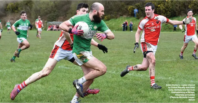  ??  ?? Aiden Slattery, Legion chased by Cathal Murphy and Colm Kelly, Rathmore in the Club Championsh­ip at Direen, Killarney on Sunday Photo by Michelle Cooper Galvin