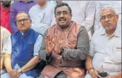  ?? PTI ?? ■ BJP general secretary Ram Madhav along with J&K deputy CM Nirmal Kumar and other party leaders addressing a press conference in Jammu on Saturday.