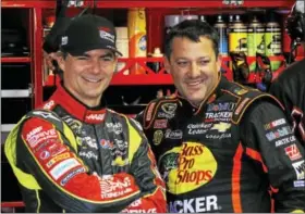  ?? THE ASSOCIATED PRESS FILE PHOTO ?? This year’s NASCAR season will begin without two of its biggest stars — Jeff Gordon, left, who retired after last season and Tony Stewart, who fractured a vertebra.